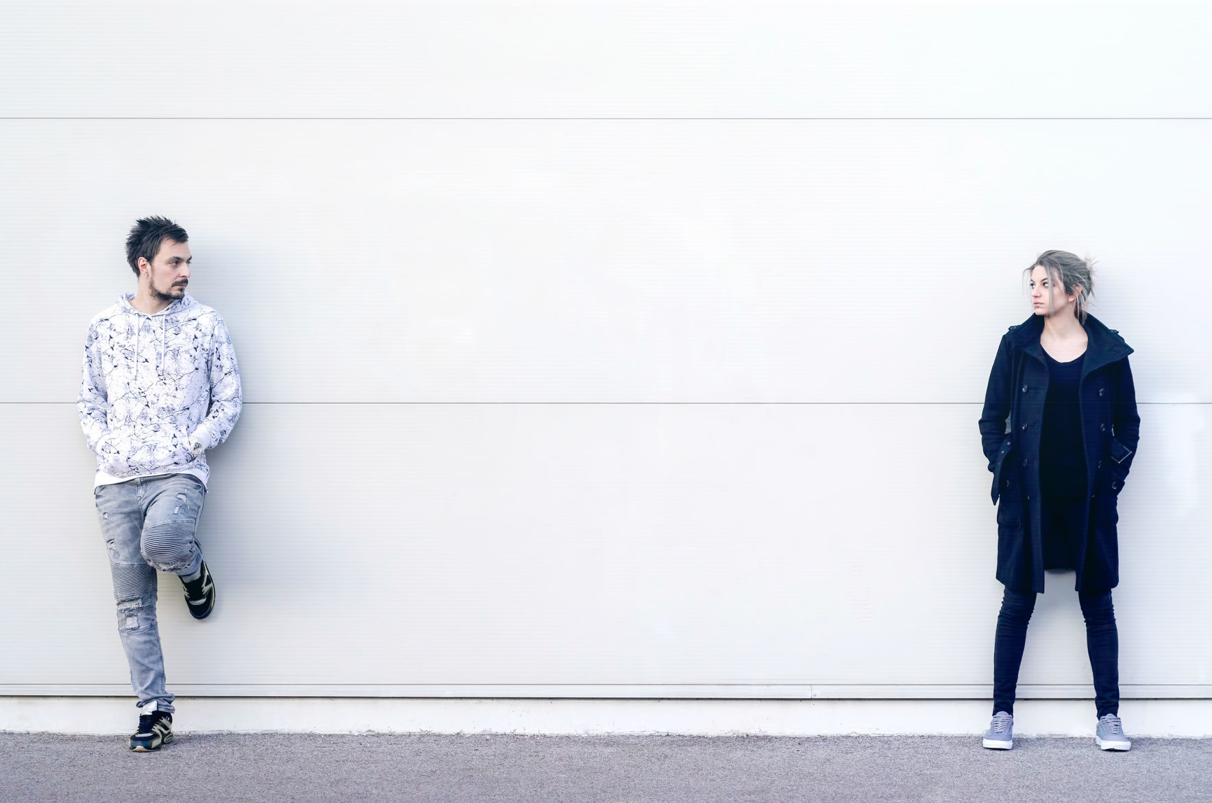 Young man and woman looking at each other