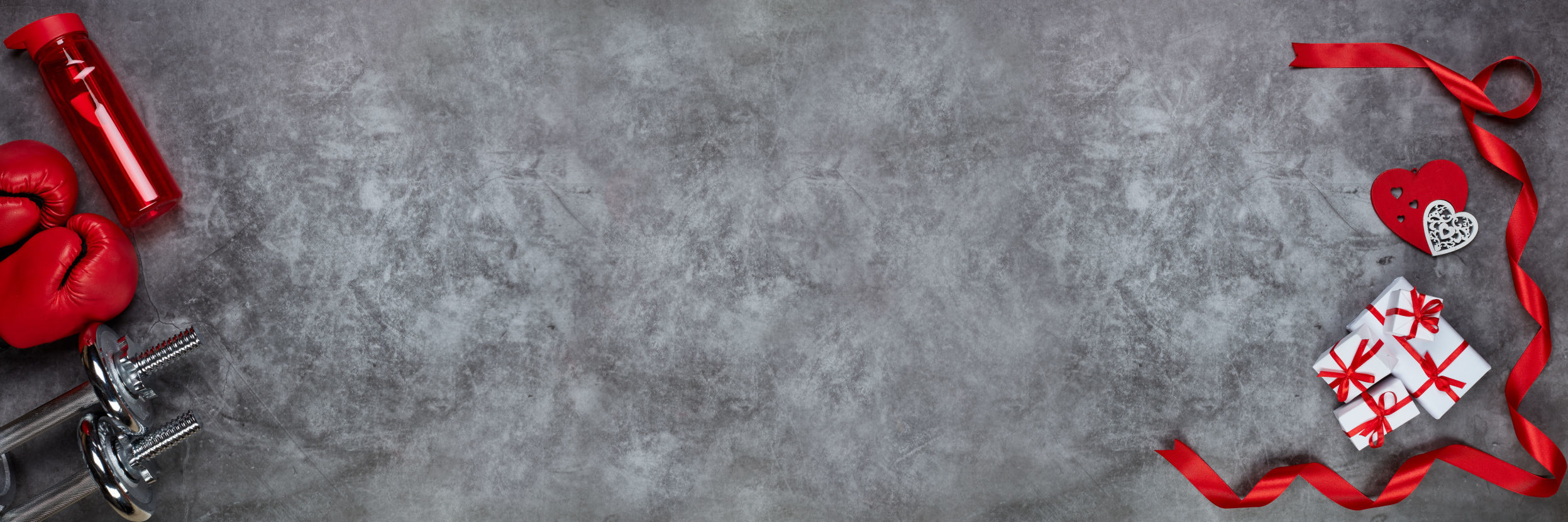 Sport equipment and red hearts. Valentine's Day. Fitness, sport, healthy lifestyle. Extra wide panorama banner background